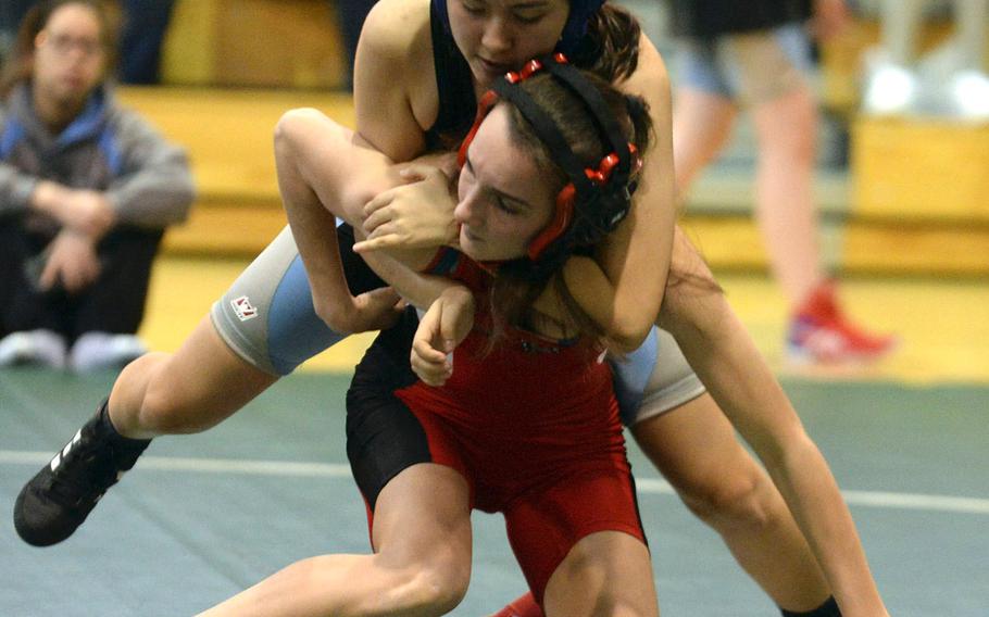 Osan's Kelly Kenyon gets the upper hand momentarily on Seoul Foreign's Lucie Mathieu during Saturday's Daegu quad-meet. Mathieu pinned Kenyon in 2 minutes, 33 seconds.