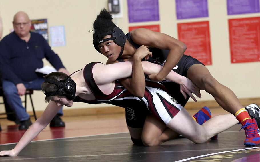 Matthew C. Perry's Shawn Swindell en route to pinning Zama's Joseph Suyama at 158 pounds during Saturday's Perry Invitational.
