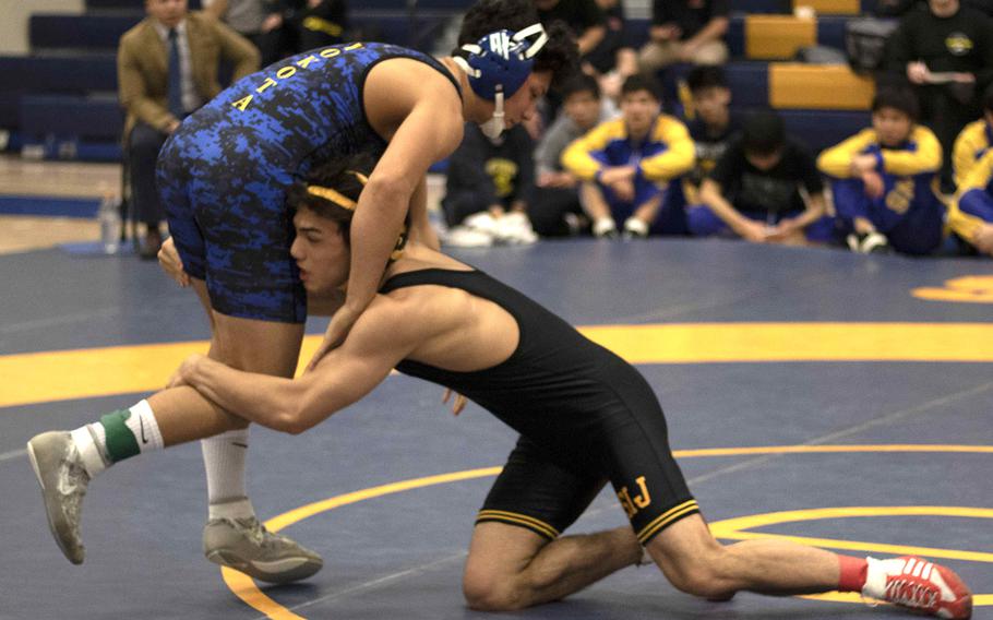 Rin Zoot, the reigning Far East tournament Outstanding Wrestler, won the 148-pound weight class during Saturday's Yokota Invitational by beating Yokota's Joey DeGrella.