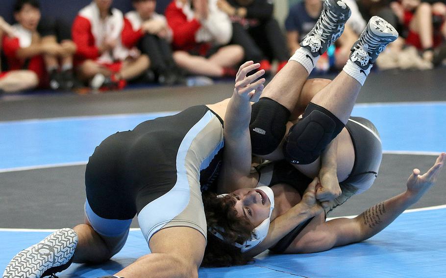 Osan's Marcus Inthavixay locks in a reverse cradle on Humphreys' Benicio Mariscal at 168 pounds en route to a pinfall victory in 1 minute, 23 seconds.