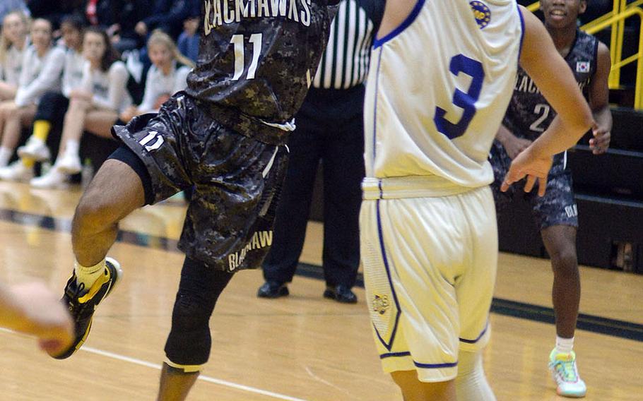 Humphreys' Devyn Lewis shoots against St. Mary's during Friday's ASIJ Kanto Classic boys game. The Blackhawks won 57-45.