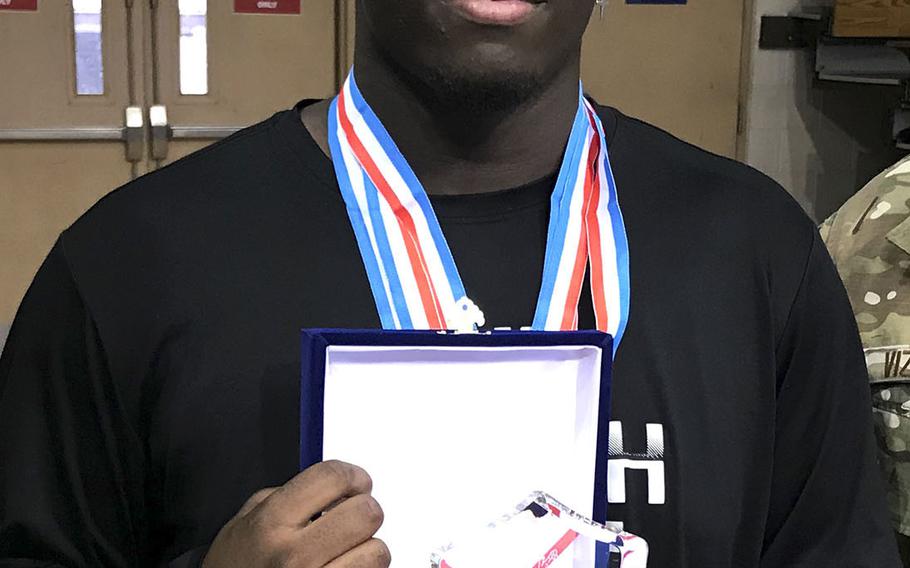 Matthew C. Perry's Marshall China, a three-time Far East wrestling tournament champion, was named the 2020 tournament's Outstanding Wrestler.