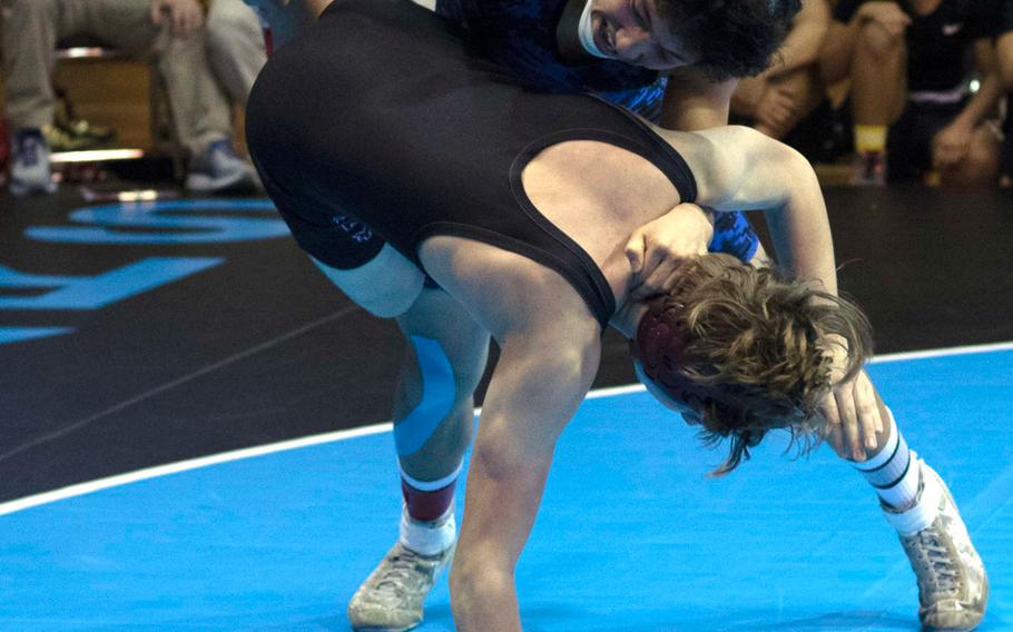 Yokota's Joey DeGrella takes charge of Perry's Kirby Kendrick en route to a pin victory in 1 minute, 17 seconds at 148 pounds.