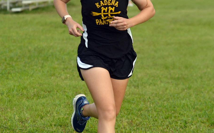 Kadena freshman Sierra Taysom crosses the finish line first among the girls in 22 minutes, 10 seconds.