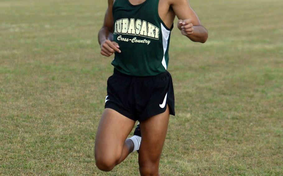 Kubasaki senior Arthur Parra pounds for home in Friday's Okinawa cross country race at Camp Foster. Parra remained unbeaten among boys, clocking 16 minutes, 22 seconds, 37 seconds faster than his previous time a week earlier.