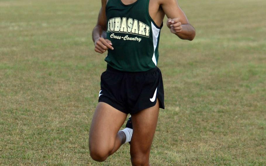 Kubasaki senior Arthur Parra pounds for home in Friday's Okinawa cross country race at Camp Foster. Parra remained unbeaten among boys, clocking 16 minutes, 22 seconds, 37 seconds faster than his previous time a week earlier.