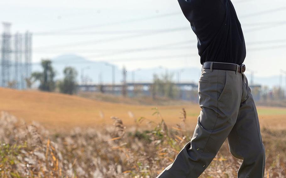 Humphreys Black's Mitchell Jones tees off en route to match-play victory over Humphreys Gold's Isaac Kim.