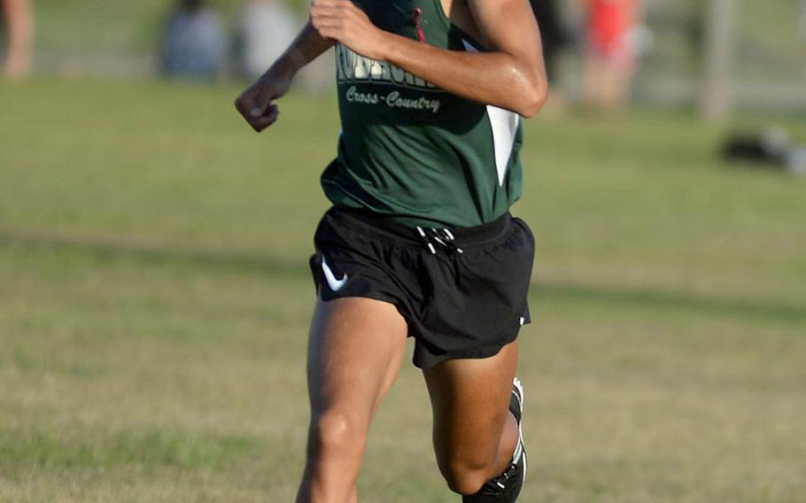 Kubasaki's Arthur Parra heads for the finish line during Friday's Okinawa cross country races. Parra stayed unbeatenin four straight races, clocking 16 minutes, 14.89 seconds.
