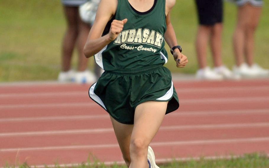 Makayla Saeteurn of Kubasaki heads for the finish of Friday's Okinawa cross country race. Saeteurn won in 21 minutes, 11.70 seconds, snapping a four-week winning streak by Kadena runners.