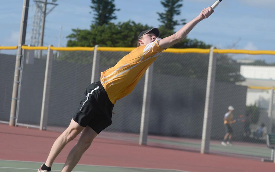 Kadena's Brett Davis is one of three players still alive in the knockout bracket of the Okinawa district singles double-elimination tennis tournament. 