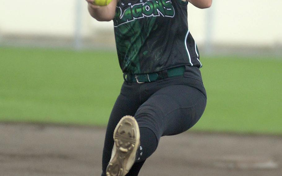 Kubasaki's Haley Patton kicks and delivers against Kadena during Friday's Okinawa softball game. Patton scattered nine hits, walked two and struck out four as the Dragons and Panthers played to an 8-8 draw.