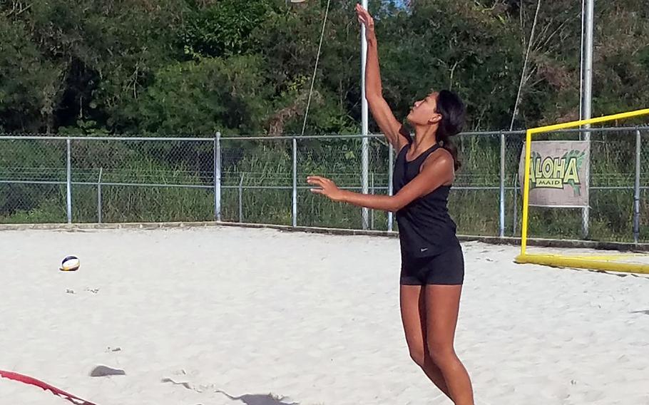 Guam High's Elisabelle Maratita serves against St. John's Red during Thursday's girls volleyball playoffs. Maratita had seven aces as the Panthers won in straight sets.