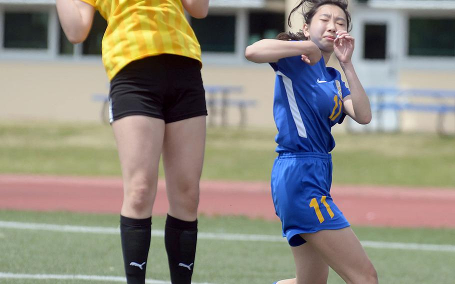 Robert D. Edgren's Layla Smith tries to settle the ball against Yokota's Emina Garcia during Saturday's DODEA-Japan girls soccer match. The Panthers won the second of two matches 5-1; earlier, the Eagles won the opener 3-1.