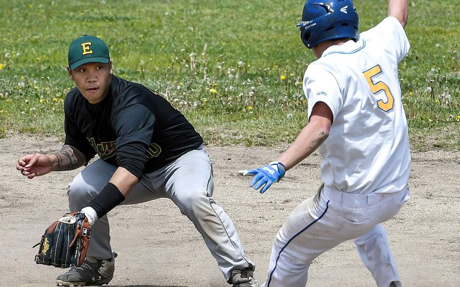 Robert D. Edgren infielder Noah Cruz readies the tag as Yokota's Connor Rowan heads for second base during Saturday's DODEA-Japan baseball game. The Eagles won 6-5, then Yokota beat Edgren 11-1 to split the series.