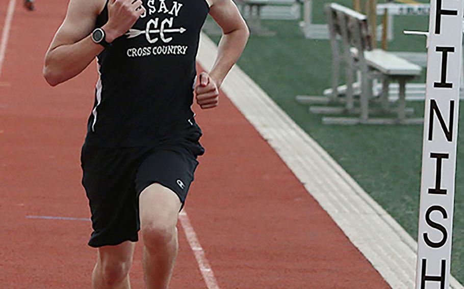 Osan's Parker Hendrickson took top spot in the boys D-II 1,600 and 3,200.