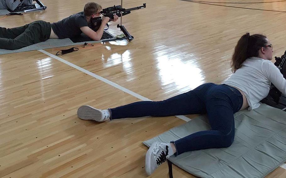 Matthew C. Perry freshman marksman Rayna Ralston, right, outshot senior teammate and captain Mason Dagostino and helped the Samurai win their first Far East competition in four years.