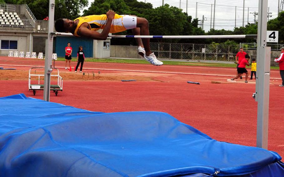 Lotty Smith from Kadena High School, clears the bar in the boys high jump. He would go on to win the event clearing the bar at 1.95 meters; just 3 centimeters shy of the record.