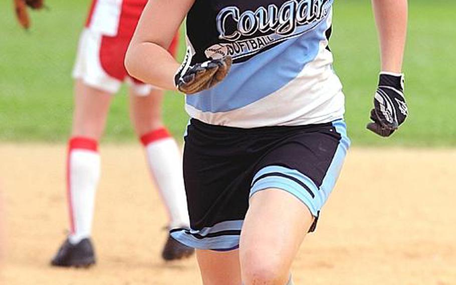 Junior Ashley LaFortune makes her way toward third base after an E.J. King throwing error during Monday's pool-play game in the 2011 Far East High School Girls Softball Tournament at Kadena Air Base, Okinawa. Osan routed the Cobras 23-1 in a three-inning run rule-shortened contest and finished Monday's play atop Pool B in round-robin play.