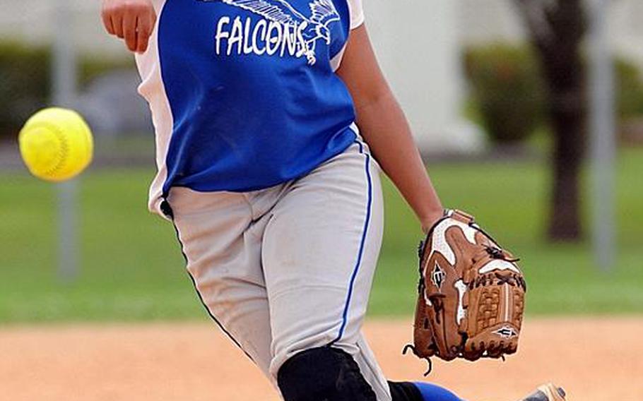 Senior Leilani Shak of Seoul American delivers against Kubasaki of Okinawa during Monday's pool-play game in the 2011 Far East High School Girls Softball Tournament at Kadena Air Base, Okinawa. The DODDS Korea champion Falcons tied the Dragons 4-4.