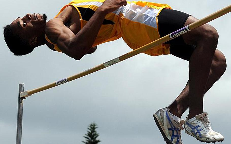 Kadena senior Lotty Smith clears the bar at 2.0066 meters, or a Pacific-record 6 feet, 7 inches, in the high jump finals during Wednesday's events in the 2011 Far East High School Track and Field Meet at Kubasaki High School, Camp Foster, Okinawa. Smith beat his own Pacific record of 1.98 meters and his Far East meet record of 1.92, and helped lead Kadena to a sweep of the boys, girls and combined teams titles.