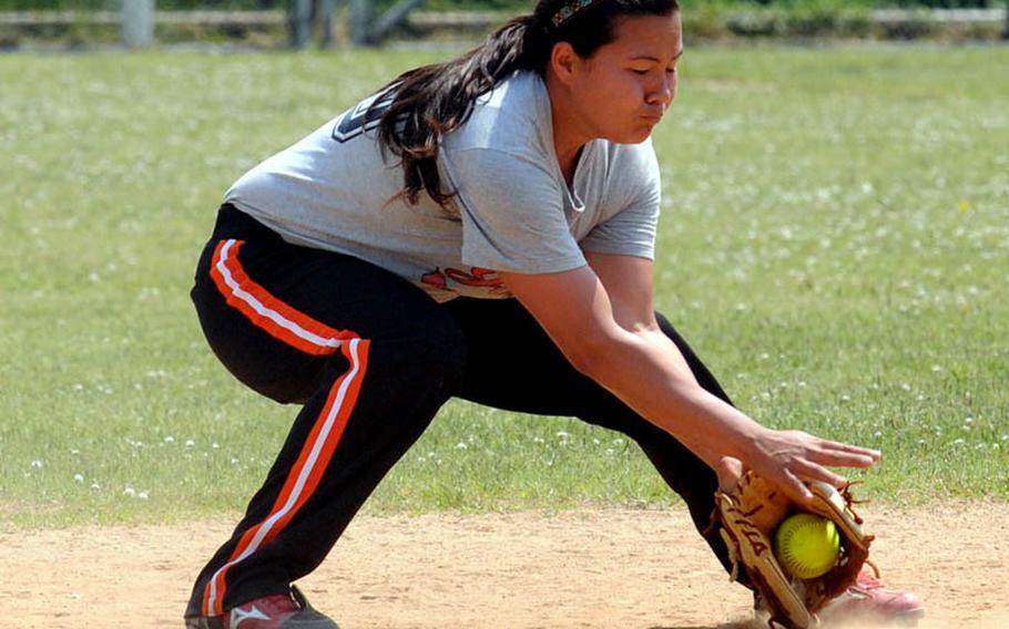 Yongsan Garrison second baseman Katie Darby fields a Camp Humphreys ground ball during Sunday&#39;s women&#39;s double-elimination playoff game in the 21st Pacificwide Open Interservice Softball Tournament at Field 3, FourPlex at Lombardo Field, South Post, Yongsan Garrison, South Korea. Yongsan rallied to beat Humphreys 9-8. Darby earned Most Valuable Player honors for champion Seoul American High School in the Far East tournament, a fastpitch event, and had to convert to slowpitch while playing for Yongsan less than 24 hours after Far East ended.