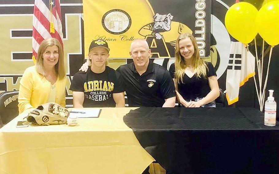 Humphreys senior Max Weidley, second from left, celebrates with his family his signing to play baseball for Division III Adrian College (Mich.) next year. At left is Jill Weidley, at right is Marine Corps Maj. Gen. Thomas Weidley and Max's twin sister Zoe.