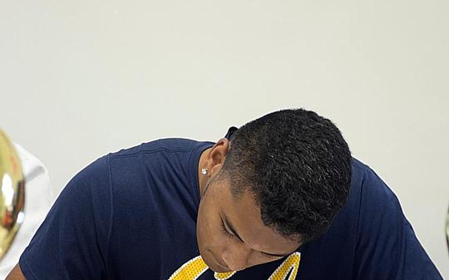 Kadena senior Siulagisipai Fuimaono signs a national letter of intent with Cal-Berkeley of the Pacific-12 Conference. He becomes the first Panther to earn a full scholarship at an NCAA Football Bowl Subdivision program.
DAVE ORNAUER/STARS AND STRIPES