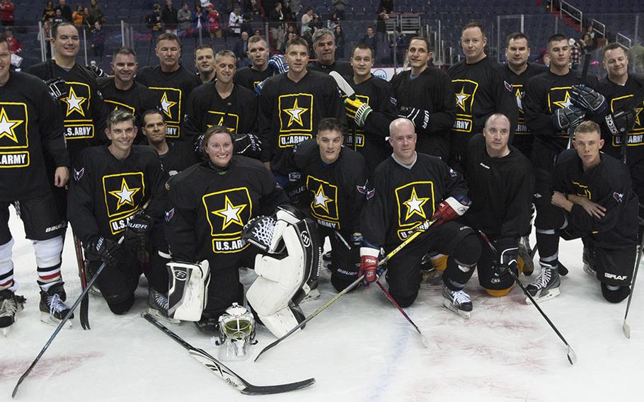 Army players pose for a team photo after a hockey game at Verizon Center in Washington, D.C., Dec. 5, 2016.