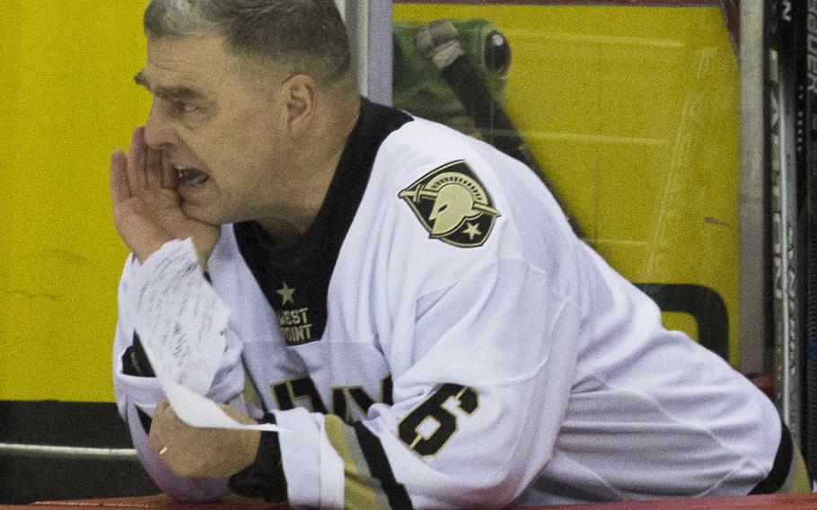 Army coach Gen. Mark Milley shouts instructions to his players during a hockey game against Navy at Verizon Center in Washington, D.C., Dec. 5, 2016.

