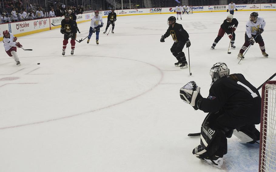 Hockey action between Army and Navy teams at Verizon Center in Washington, D.C., Dec. 5, 2016.