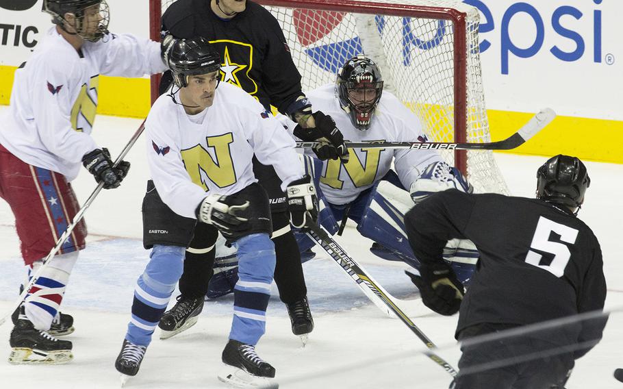 Hockey action between Army and Navy teams at Verizon Center in Washington, D.C., Dec. 5, 2016.