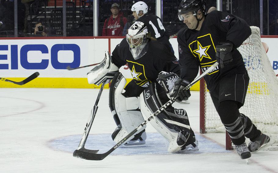 Hockey action between Army and Navy teams at Verizon Center in Washington, D.C., Dec. 5, 2016.