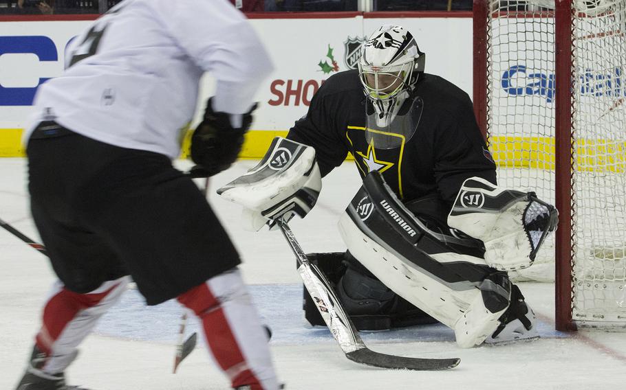 Hockey action between Army and Navy teams at Verizon Center in Washington, D.C., Dec. 5, 2016.