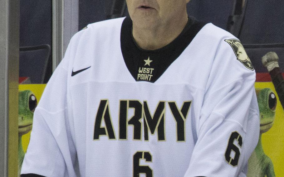 Army coach Gen. Mark Milley watches from the bench as his team takes on Navy in a hockey game at Verizon Center in Washington, D.C., Dec. 5, 2016.