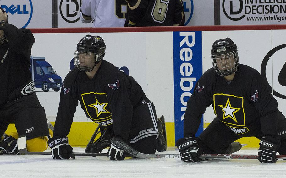 Army players loosen up before a hockey game against a Navy team at Verizon Center in Washington, D.C., Dec. 5, 2016.