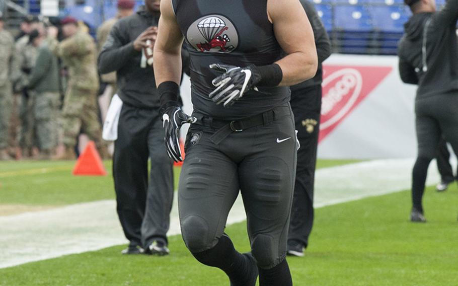 Warming up before the start of the Army-Navy game on Dec. 10, 2016, in Baltimore, MD.