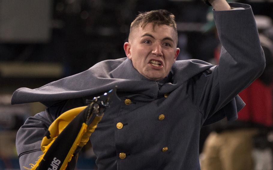 A happy West Point cadet races onto the field after Army beat Navy, 21-17, Dec. 10, 2016 at Baltimore.