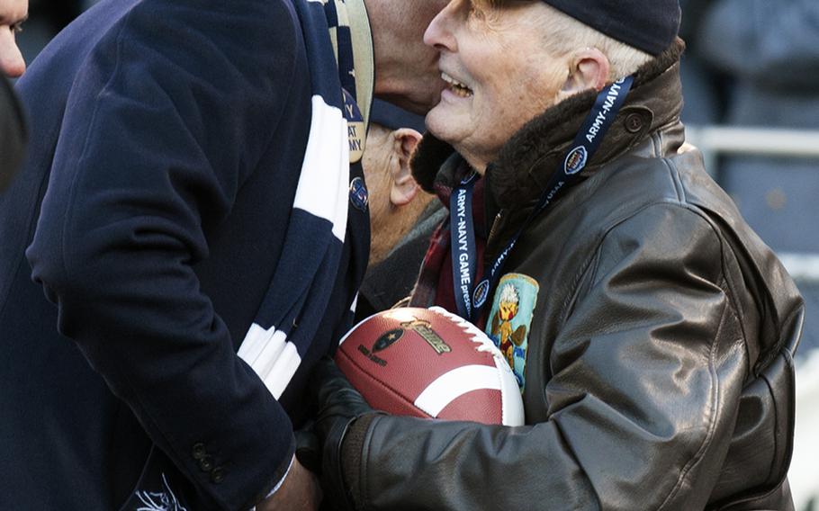 A World War II veteran is honored during a break in the Army-Navy game, Dec. 10, 2016. 