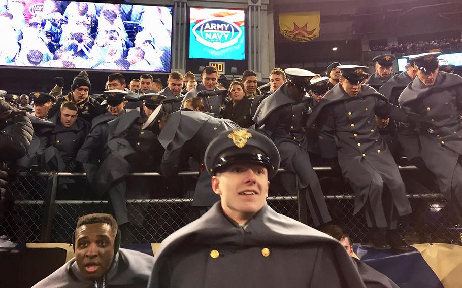 Army fans pour onto the field at the end of the Army-Navy game at M&T Bank Stadium in Baltimore, Md., Dec. 10, 2016. Army won, 21-17.