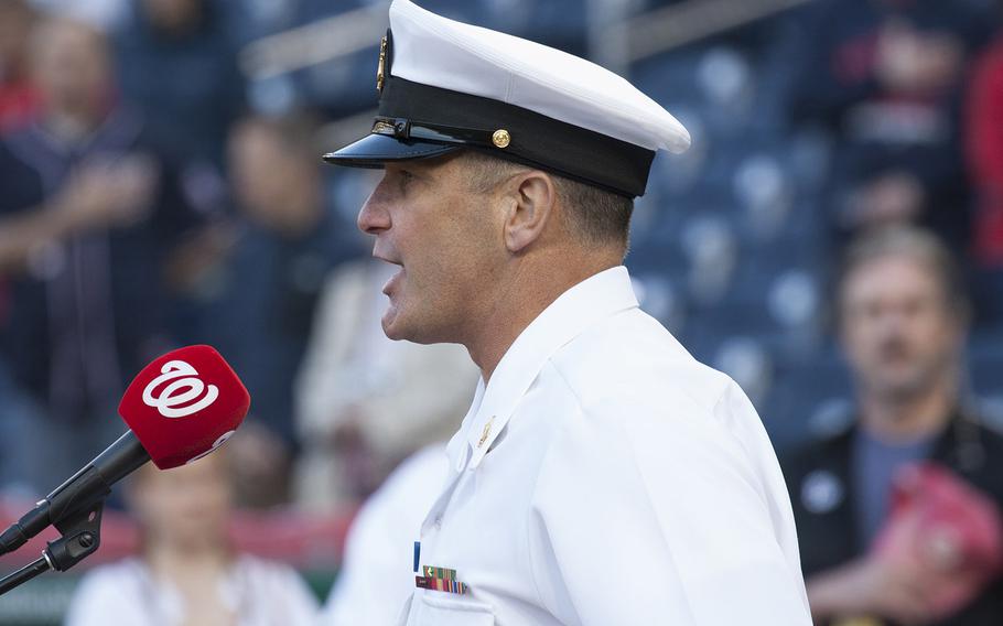 Musician 1st Class Kenny Ray Horton of the Navy Band sings the national anthem on U.S. Navy Day at Nationals Park in Washington, D.C., May 3, 2017.