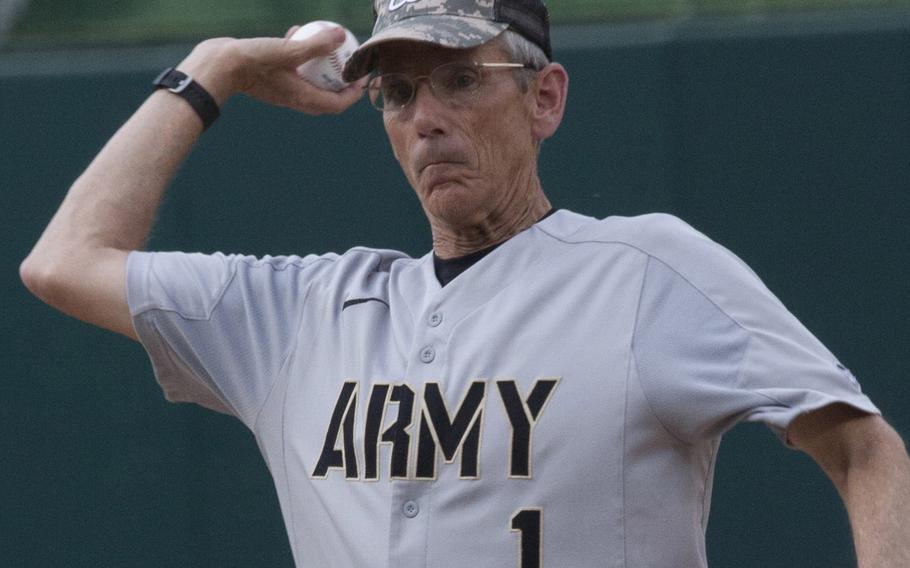 Acting Secretary of the Army Robert M. Speer throws out the ceremonial first pitch on U.S. Army Day at Nationals Park in Washington, D.C., June 12, 2017.