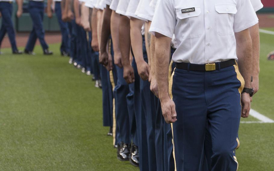 Soldiers from the 1st and the 4th Battalions of the 3rd Infantry Regiment walk onto the field on U.S. Army Day at Nationals Park in Washington, D.C., June 12, 2017.