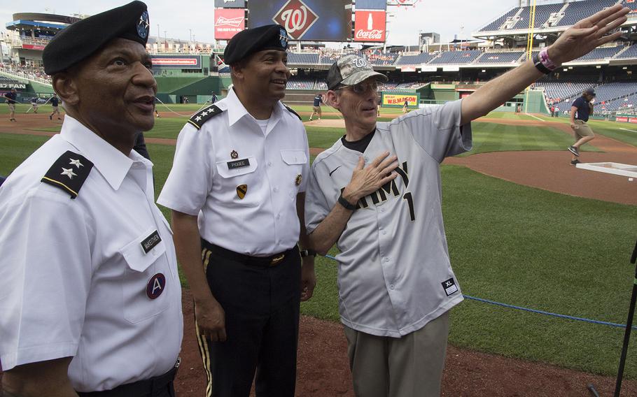 Acting Secretary of the Army Robert M. Speer, right, talks with Maj. Gen. Timothy M. McKeithen, left, Deputy Director of the Army National Guard and Lt. Gen. Aundre F. Piggee, Deputy Chief of Staff, G4 (Army Logistics), on U.S. Army Day at Nationals Park in Washington, D.C., June 12, 2017.