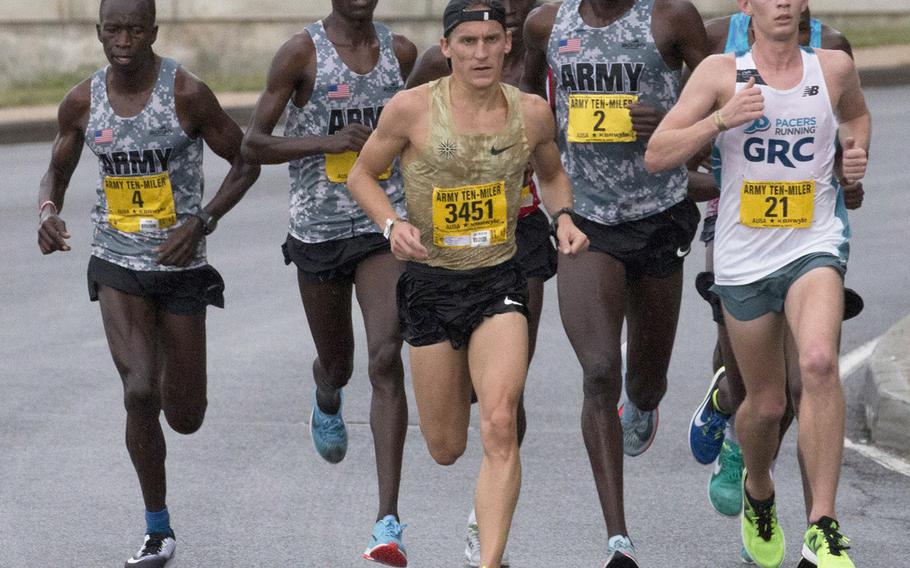 The lead pack in the Army Ten-Miler approaches the two-mile mark in Washington, D.C., Sunday, Oct. 8, 2017. U.S. Army Spc. Haron Lagat (2) was the eventual champion.