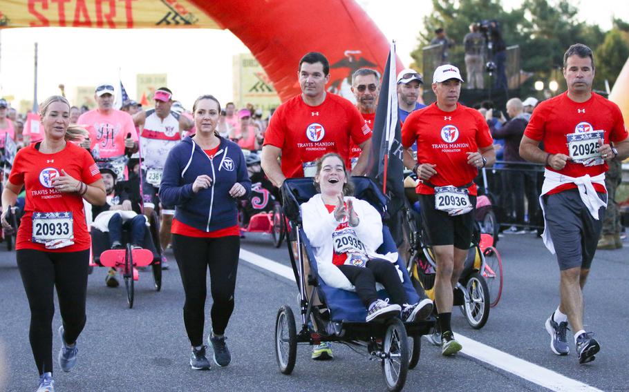 Runners take off at the start of the 42nd Marine Corps Marathon, held in Washington, D.C., on Sunday, Oct. 22, 2017.  