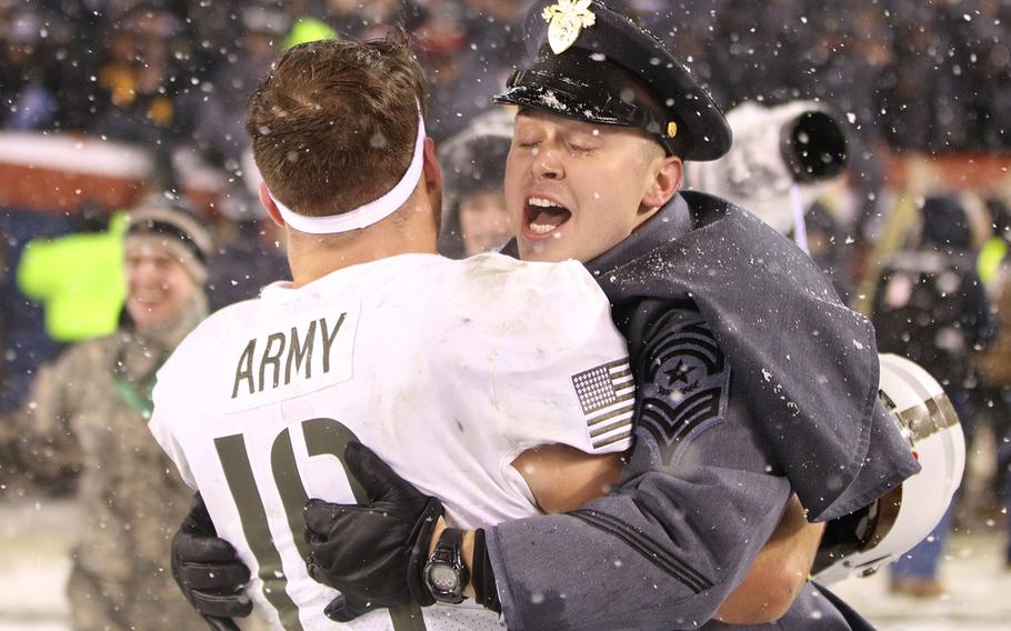 West Point cadets and Black Knights players alike celebrate after Army snatched victory from Navy for the second year in a row, winning the annual Army-Navy game 14-13.
