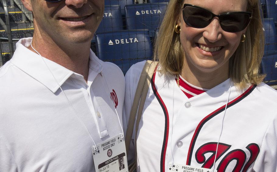 Military caregiver and 2017 Dole Caregiver Fellow Megan Smith and her husband, Army Lt. Col. Matt Smith, pose for a photo before a game between the Washington Nationals and Boston Red Sox in Washington, D.C., July 4, 2018. Megan Smith threw out the ceremonial first pitch.