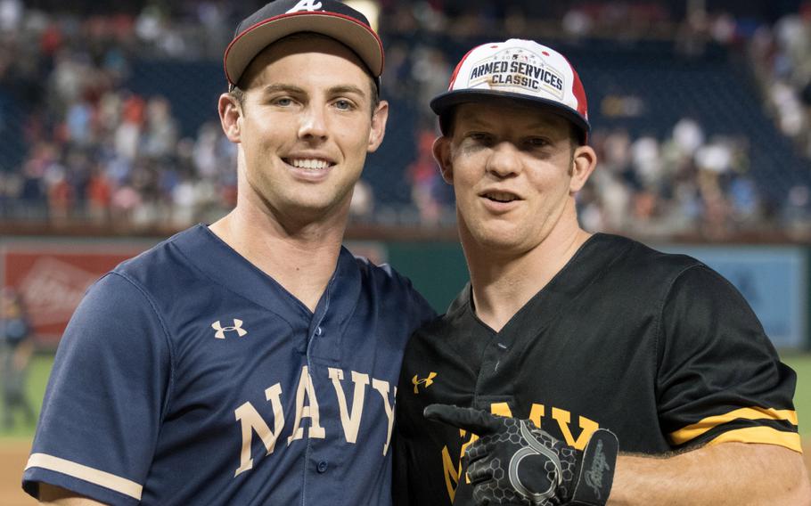 U.S. Navy Petty Officer 3rd Class Russ Newbern and Army's Staff Sgt. Jacob Hensal will get a chance to hit home runs in between big-league batters at Major League Baseball's All-Star home run derby on Monday, July 16, 2018. 