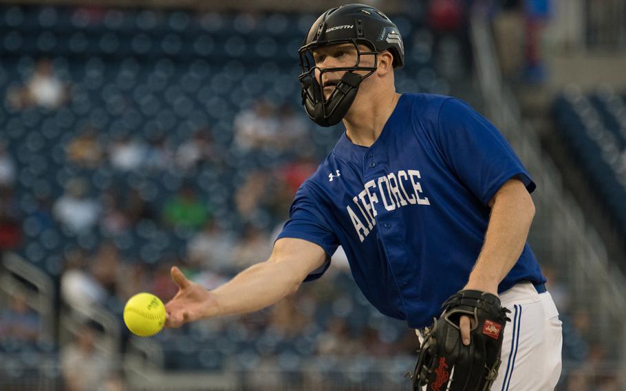 U.S. Air Force Master Sgt. Matthew Campbell pitched and represented his service at a home run derby following the 2018 Armed Forces Classic, a co-ed softball game held at Nationals Park in Washington on Friday, July 13, 2018.