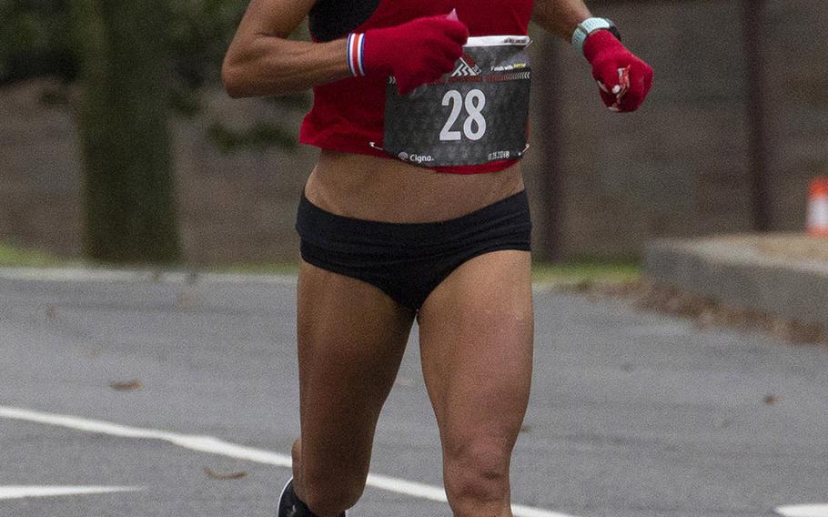 Jenny Mendez runs near the 15-mile mark on her way to a win in the women's division of the 43rd Marine Corps Marathon in Washington, D.C., Oct. 28, 2018.
